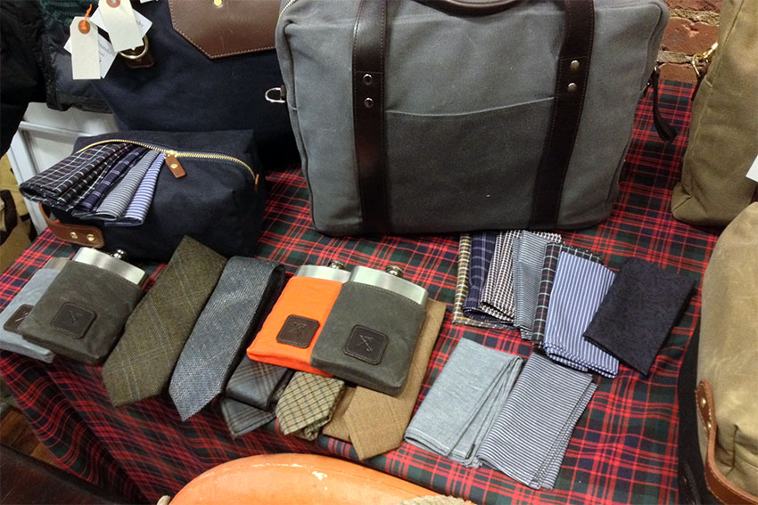 Some of Ernest Alexanders many products, including a charcoal grey Watson briefcase.